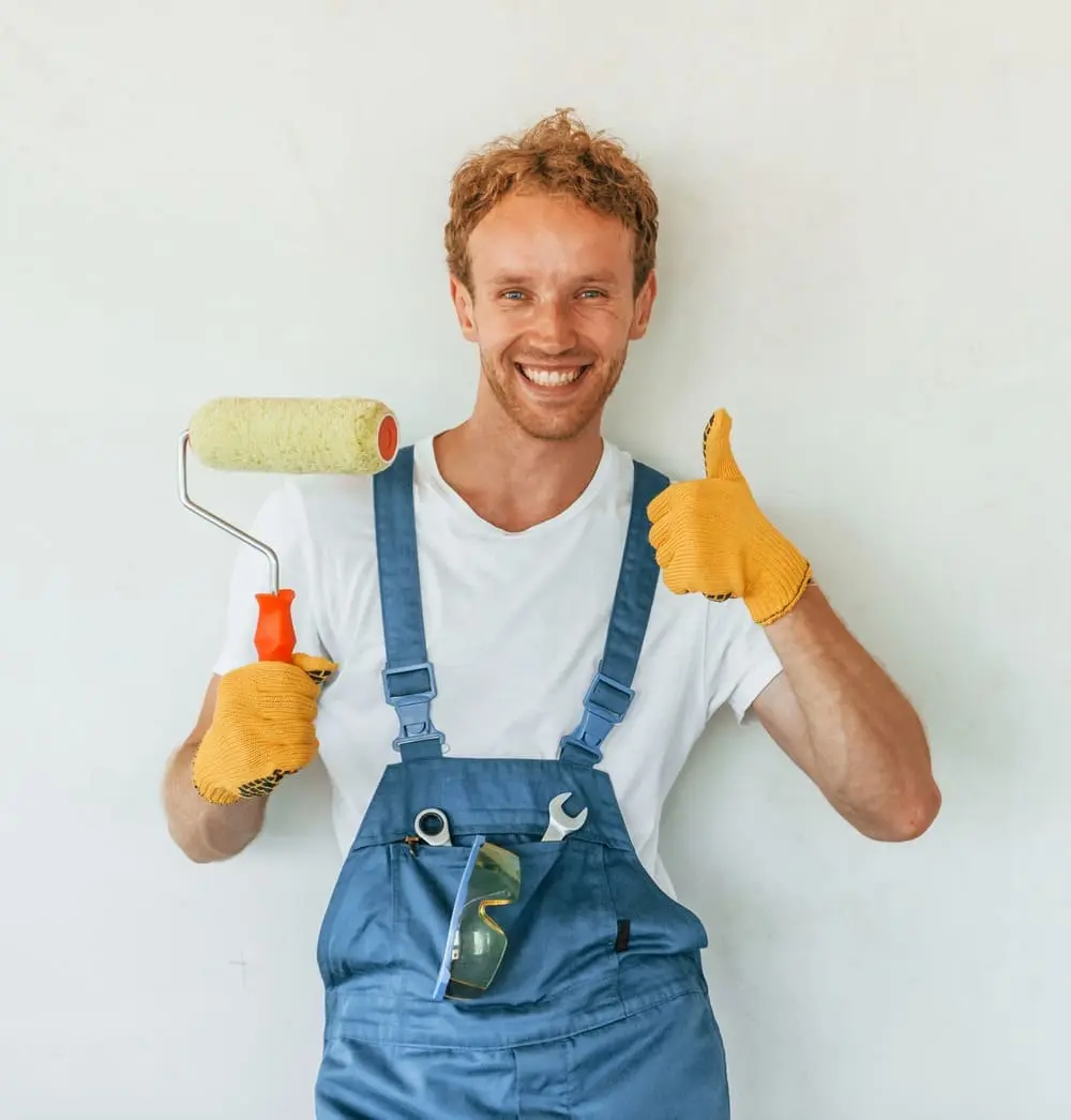 Professional painter from Tricoat Pte Ltd providing 5 star painting service in a Singapore home.